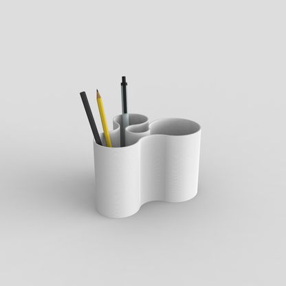 White Coral Crest pot utilized as a stylish stationery holder.